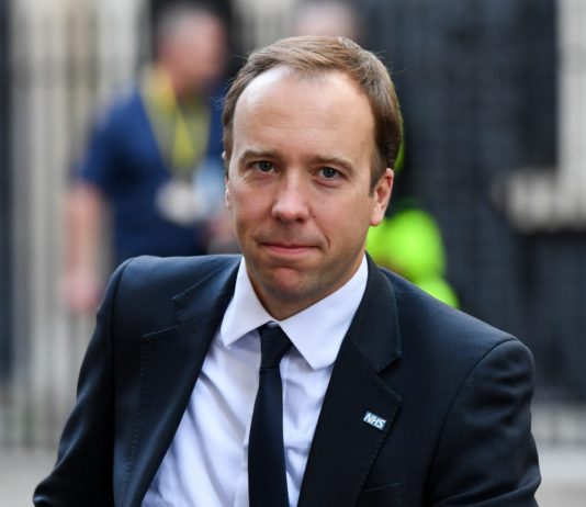 COVID-19: UK warns of tougher social distancing measures