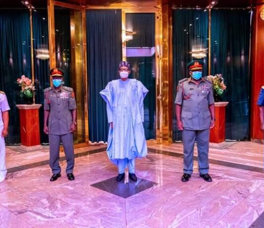 President Buhari charges new service chiefs