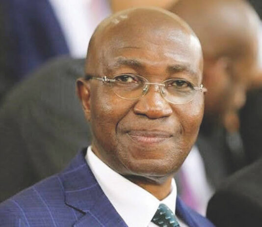 President Buhari greets foremost lawyer, Wole Olanipekun at 70