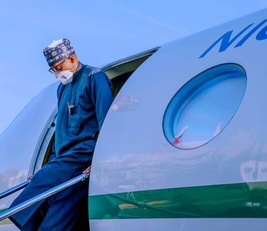 President Buhari arrives Paris for official visit, peace forum