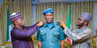 Governor Yahaya Bello Decorates Escort Commander, Abdullahi