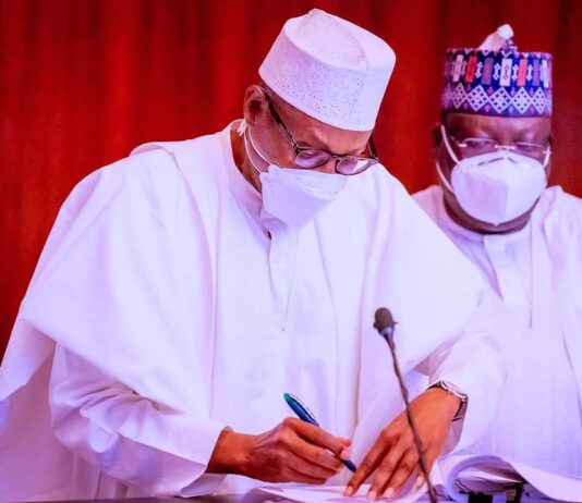 President Buhari signs three bills into law in renewed fight against money laundering, terrorism, other financial crimes