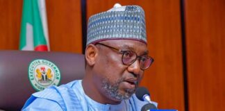 Governor Sani Bello swears in new commissioner, charges him to do his best