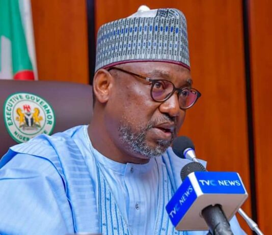 Governor Sani Bello swears in new commissioner, charges him to do his best