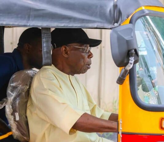 Obasanjo Rides Tricycle, Picks Passengers In Abeokuta