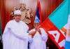 Osun 2022: President Buhari presents party flag to Oyetola, commends him for tireless service to the people