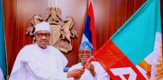 Osun 2022: President Buhari presents party flag to Oyetola, commends him for tireless service to the people