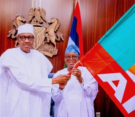 Osun 2022: President Buhari presents party flag to Oyetola, commends him for tireless service to the people