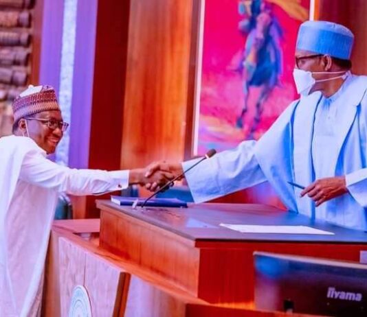 President Buhari Swears In Muhammed Bello As RMAFC Chairman